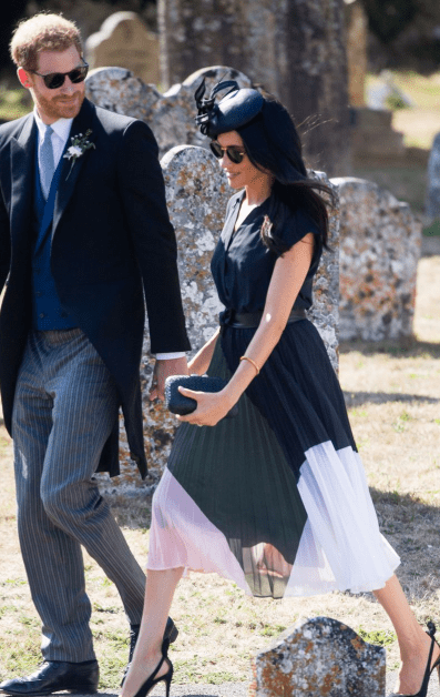 A person in a black shirt

Description automatically generated